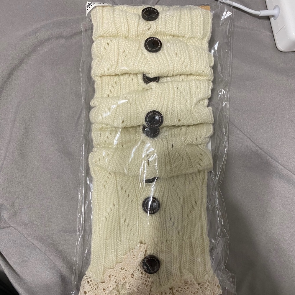 Beige leg warmers with lace detail
